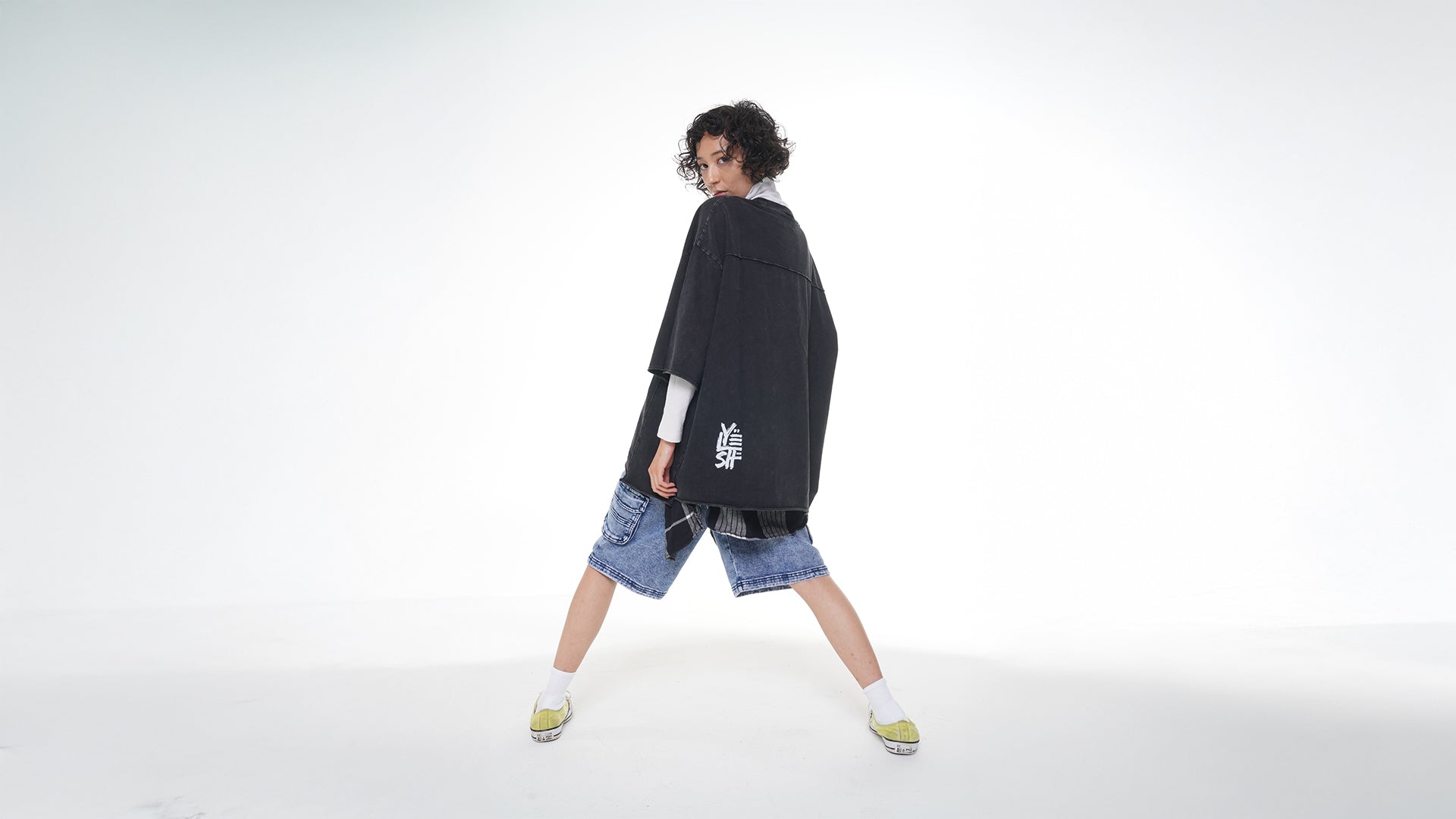 Yelsh Model Showing the back of the No Signal T-shirt with the Yelsh Street Logo on the back on a white background